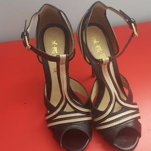 Lamb black and cream heels